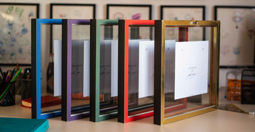 Supreme Artokens editions displayed in blue, purple, green, red and gold frames